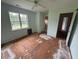 Bedroom featuring natural light, large windows, and attached doors at 101 New Castle Ct, Youngsville, NC 27596