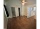 Bedroom with wooden floors and natural light streaming through a window at 101 New Castle Ct, Youngsville, NC 27596