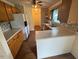 Functional kitchen with ample counter space and wood cabinets, ready for your culinary adventures at 101 New Castle Ct, Youngsville, NC 27596