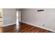 Bedroom with hardwood floors and access to the bathroom at 101 Stefi Ct, Garner, NC 27529