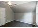 Bedroom with a ceiling fan, a closet, carpeted floors, and natural lighting from the window at 101 Stefi Ct, Garner, NC 27529