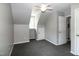 Bedroom featuring a ceiling fan, closet, and gray carpet at 101 Stefi Ct, Garner, NC 27529