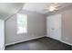 This bedroom features carpeted floors, a ceiling fan, and a window view of the outdoors at 101 Stefi Ct, Garner, NC 27529