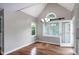 Bright dining area with vaulted ceiling, chandelier and backyard access at 101 Stefi Ct, Garner, NC 27529