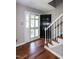 Welcoming entryway with gleaming hardwood floors and staircase at 101 Stefi Ct, Garner, NC 27529