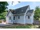 Rear exterior of home with wood deck and manicured landscaping at 101 Stefi Ct, Garner, NC 27529