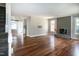 Spacious living room with hardwood floors and a cozy fireplace at 101 Stefi Ct, Garner, NC 27529