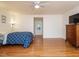 Spacious bedroom featuring hardwood floors and chest of drawers at 10101 Daviton Ct, Raleigh, NC 27615