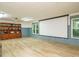 Large living room features recessed lighting, a ceiling fan, and a wall-mounted projector screen, perfect for entertaining at 10101 Daviton Ct, Raleigh, NC 27615