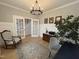 Well-lit office space with elegant decor, offering a comfortable and productive work environment with natural light at 108 Sweetbay Park, Youngsville, NC 27596