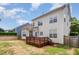 The property features a wooden deck and large backyard at 10847 Bedfordtown Dr, Raleigh, NC 27614