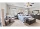 Bedroom with gray walls, carpet, furniture and decorations at 10859 Bedfordtown Dr, Raleigh, NC 27614