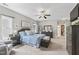 Bedroom with gray walls, carpet, dresser and furnishings at 10859 Bedfordtown Dr, Raleigh, NC 27614