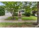 Charming two-story home with landscaped yard, inviting porch, and two-car garage at 10859 Bedfordtown Dr, Raleigh, NC 27614