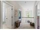 Upstairs hallway with views into the bedrooms and bathrooms at 10859 Bedfordtown Dr, Raleigh, NC 27614
