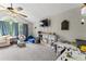 Vaulted playroom with toys and seating at 10859 Bedfordtown Dr, Raleigh, NC 27614