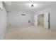 Finished basement space with neutral walls and carpet ready for customization at 109 Aspenridge Dr, Holly Springs, NC 27540
