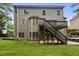 Home's exterior featuring multi-level decks and patios and a backyard at 109 Aspenridge Dr, Holly Springs, NC 27540