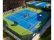 Aerial view of the well-maintained community tennis courts at 109 Aspenridge Dr, Holly Springs, NC 27540