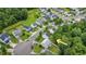 Aerial view of the home in a well-maintained neighborhood with mature landscaping at 110 Knightwood Dr, Durham, NC 27703