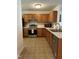 Functional kitchen with white counters and stainless steel appliances at 110 Knightwood Dr, Durham, NC 27703