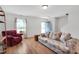 Spacious living room with hardwood flooring and ample natural light at 110 Knightwood Dr, Durham, NC 27703