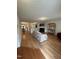 Cozy living room featuring a fireplace and hardwood floors at 110 Knightwood Dr, Durham, NC 27703