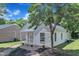 Exterior home view of a charming home with curb appeal, and mature trees at 1202 Kendall Dr, Durham, NC 27703