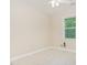 Cozy bedroom with neutral walls, plush carpet, and a bright window at 1304 Barnford Mill Rd, Wake Forest, NC 27587