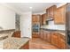 Well-equipped kitchen with modern appliances, ample cabinetry, and stylish granite countertops at 1304 Barnford Mill Rd, Wake Forest, NC 27587