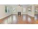 Spacious living area filled with natural light showcases a fireplace and hardwood floors at 1304 Barnford Mill Rd, Wake Forest, NC 27587