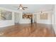 Bright, open living space with hardwood floors and views into the kitchen and dining areas at 1304 Barnford Mill Rd, Wake Forest, NC 27587