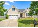 Charming single-Gathering home with a well-maintained lawn, attached garage, and inviting curb appeal at 1400 Manley Ct, Fuquay Varina, NC 27526
