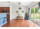 Dining area with hardwood floors and sliding glass doors leading to a patio at 1400 Manley Ct, Fuquay Varina, NC 27526