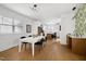 Open dining area with view of the kitchen and living room at 1410 Joe Louis Ave, Raleigh, NC 27610