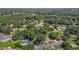 Overhead view of the neighborhood showing the arrangement of homes, mature trees, and streets in the community at 1442 Morningside Dr, Burlington, NC 27217