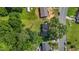 Aerial view showing the property's location, boundaries, and surrounding neighborhood with mature trees at 1442 Morningside Dr, Burlington, NC 27217