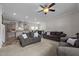 Open concept living room that flows into a kitchen and dining area with natural lighting at 1442 Morningside Dr, Burlington, NC 27217