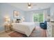 Bedroom showcasing a plush bed, soft lighting, and a scenic window view at 1601 Bellenden Dr, Durham, NC 27713