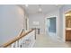 Hallway featuring carpeted floors and an open doorway at 1601 Bellenden Dr, Durham, NC 27713