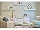 Stylish living room showcasing elegant shelves, modern decor, and comfortable seating at 1601 Bellenden Dr, Durham, NC 27713