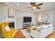 Comfortable living room features a fireplace, modern decor, and hardwood flooring at 1601 Bellenden Dr, Durham, NC 27713