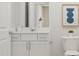 Modern bathroom with white vanity, stylish fixtures, and a clean, minimalist design at 164 Paramount Dr, Smithfield, NC 27577
