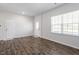Bright living room with modern flooring and neutral paint at 167 Young Farm Dr, Lillington, NC 27546