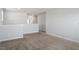 Spacious loft area with neutral walls and plush carpet flooring at 167 Young Farm Dr, Lillington, NC 27546
