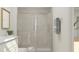 Modern bathroom featuring a sleek glass shower, contemporary fixtures, and a bright, airy ambiance at 172 Paramount Dr, Smithfield, NC 27577