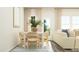 Open dining room offers seating for six with seamless flow into the living area at 172 Paramount Dr, Smithfield, NC 27577