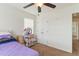 Bedroom with ceiling fan, closet, natural light and neutral color palette at 19 Kimberly Ct, Lillington, NC 27546