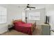 Bedroom with windows and wooden furnishings, offering a warm and cozy feel at 19 Kimberly Ct, Lillington, NC 27546