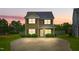 Charming two-story home with a well-manicured lawn and concrete driveway at 19 Kimberly Ct, Lillington, NC 27546